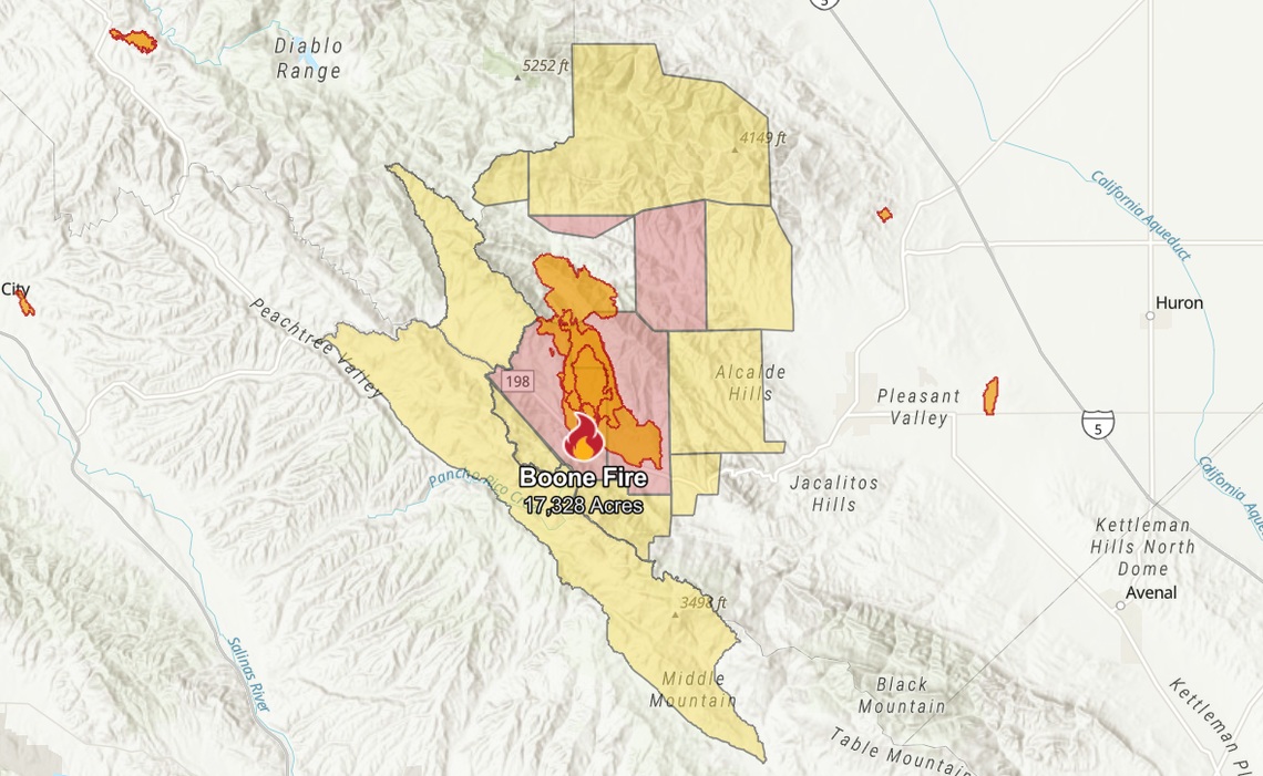 This screenshot of a map of the Boone Fire shows the recent perimeters of the wildfire burning in Fresno County in orange as well as areas under evacuation orders (red) and evacuation warnings (tan) as of Friday, Sept. 6, 2024.