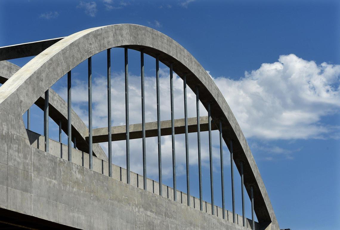 Clouds pass the arching feature of the HSR Viaduct over the the San Joaquin River, June 17, 2021.