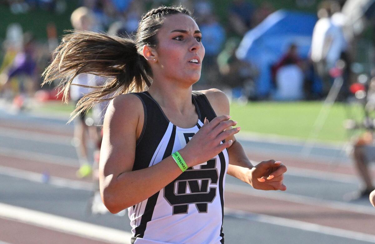 Clovis North’s Emerson Parks looks up to the scoreboard to see her first place finish in the 400 at the CIF Central Section Masters track and field meet, held at Veterans Memorial Stadium on Saturday, May 20, 2023 in Clovis.
