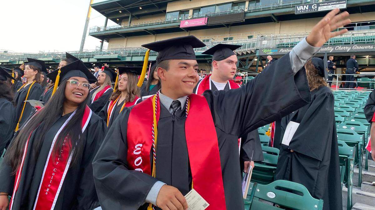 This year’s 2021 FCC Dean’s Medallion Award recipients De Colette Quezada and Sylas Ramos, at the start of the June 23 outdoors commencement at Chukchansi Park in downtown Fresno. Ramos was also chosen by President Carole Goldsmith to receive this year’s Tony Cantú President’s Medallion.