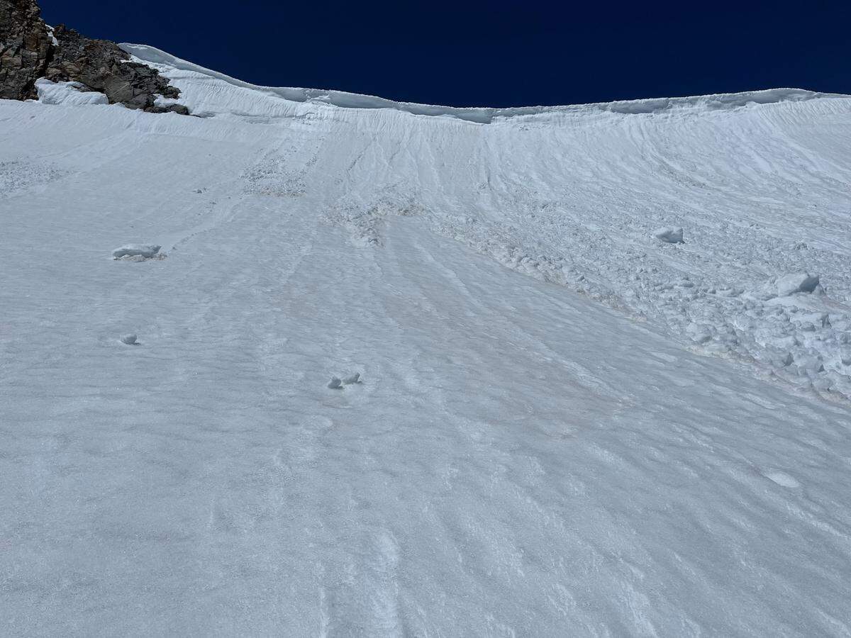 Clovis ski mountaineer Ryan Soares encountered this dangerous overhanging cornice on his way up to Copper Mine Pass while completing the Sierra High Route in the Fastest Known Time. Fortunately, a section of the cornice had fallen away allowing Soares to climb over it with crampons.