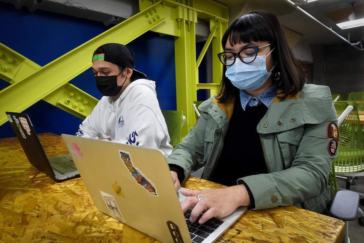 Miguel Hernandez, former apprentice, now an online marketing analyst and Emelia Guadarama, an apprentice in the Bitwise program, which gives people from ‘marginalized’ communities opportunity to enter the tech field.
