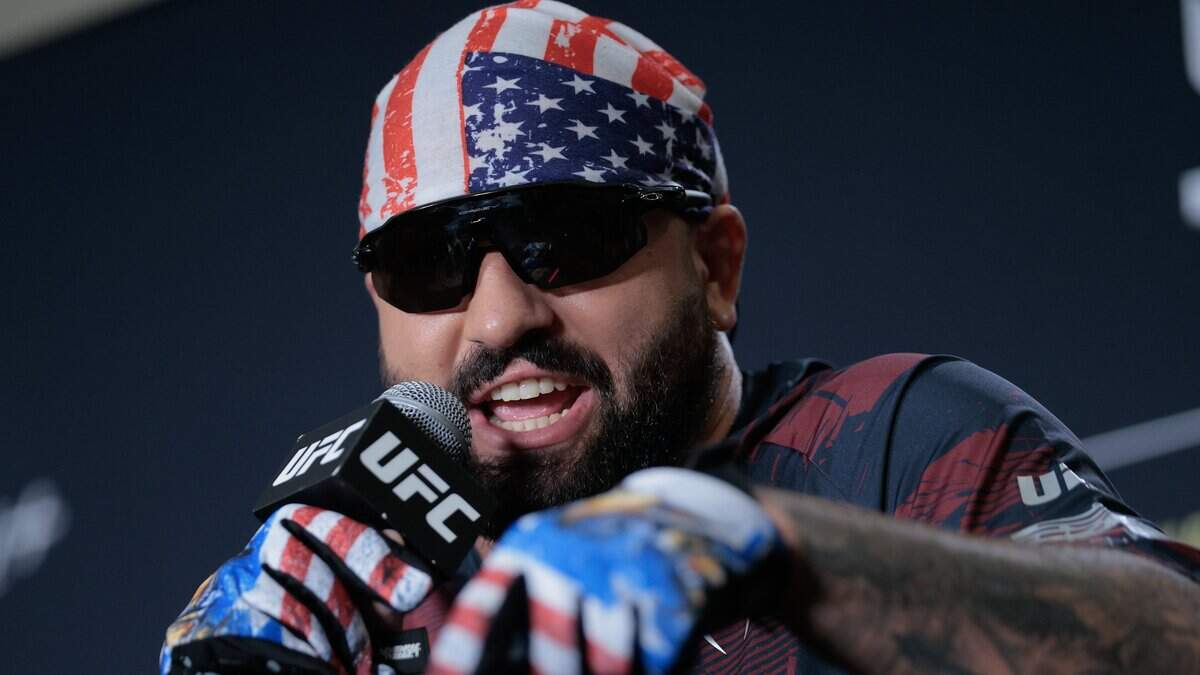 No. 5 UFC heavyweight fighter Josh Hokit answers questions during the UFC Freedom 250 Media Day at the JW Marriott Hotel on June 10, 2026 in Washington, DC. Organized by the Ultimate Fighting Championship (UFC) -- the world's largest professional mixed martial arts promotion company -- the event is being hosted by U.S. President Donald Trump on his birthday and will take place on the White House's South Lawn on June 14.