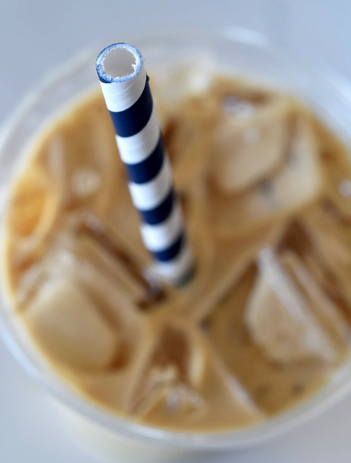 A compostable straw tops a coffee drink at The Revue, a recent move toward being more eco-friendly. The coffee shop also has switched to compostable cups and lids.