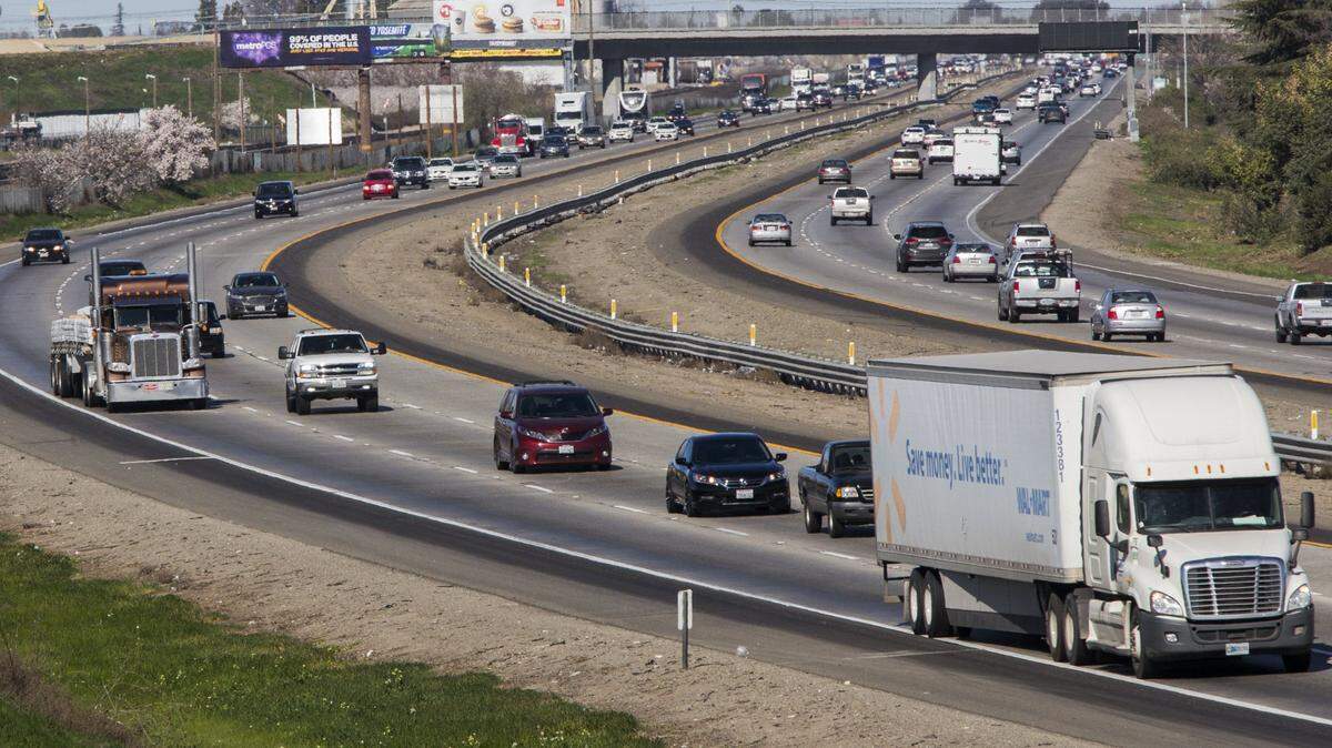 Semi Trucks travel along Highway 99 through Stanislaus County Sunday, Feb 18th, 2018.