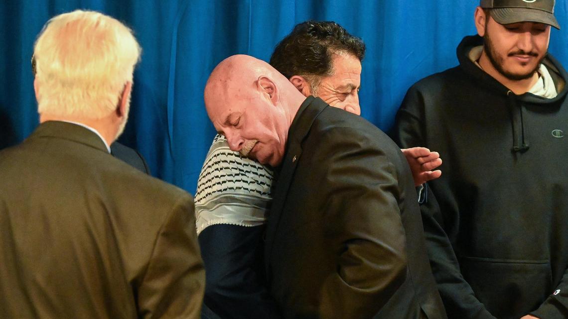 Fresno Mayor Jerry Dyer hugs Abdul Jawad, a Palestinian business owner in Fresno, following a news conference to promote unity among local Palestinian, Jewish and Muslim groups in Fresno, at Fresno City Hall on Thursday, Dec. 21, 2023.
