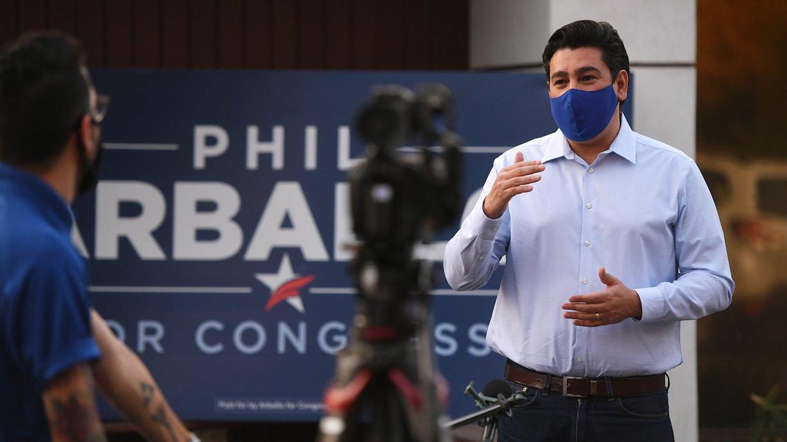 Democrat Phil Arballo, running for U.S. House challenging Devin Nunes for California’s 22nd Congressional District, appears for media interviews outside his campaign headquarters on election night Tuesday, Nov. 3, 2020 in Fresno.