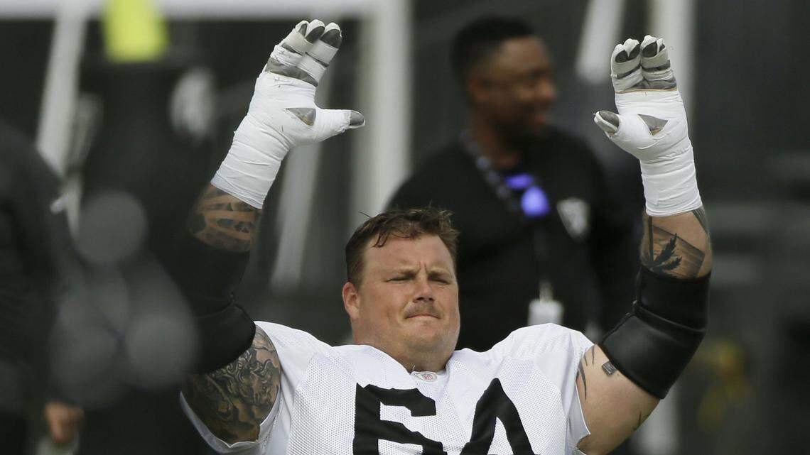 FILE - In this July 29, 2019, file photo, Oakland Raiders center Richie Incognito stretches during NFL football training camp in Napa, Calif. Guard Richie Incognito returns to the Raiders after missing two games for a suspension for violating the NFL’s personal conduct policy.