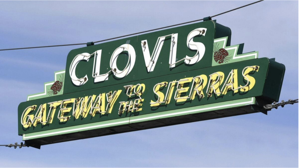 Historic Old Town Clovis “Gateway to the Sierras” sign over Clovis Avenue photographed in 2021.