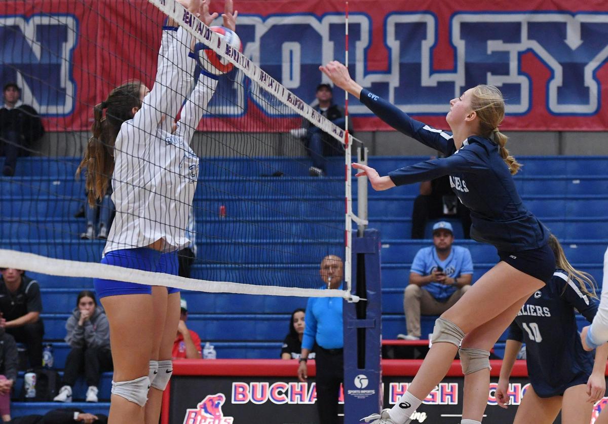 Central Valley Christian’s Erika Vander Maarl, right, spikes the ball against Buchanan in the Central Section’s Division II girls volleyball championship Thursday, Nov. 3, 2022 in Clovis.