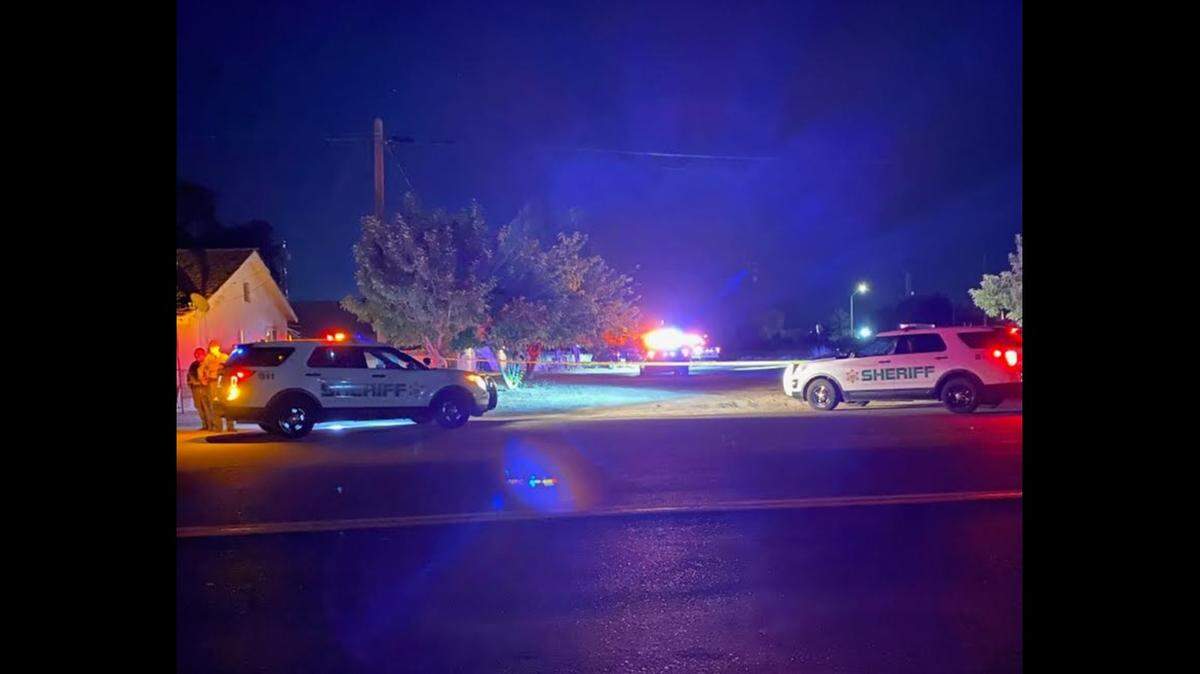 Tulare County Sheriff’s deputies at the scene of a fatal shooting Monday night in Pixley.