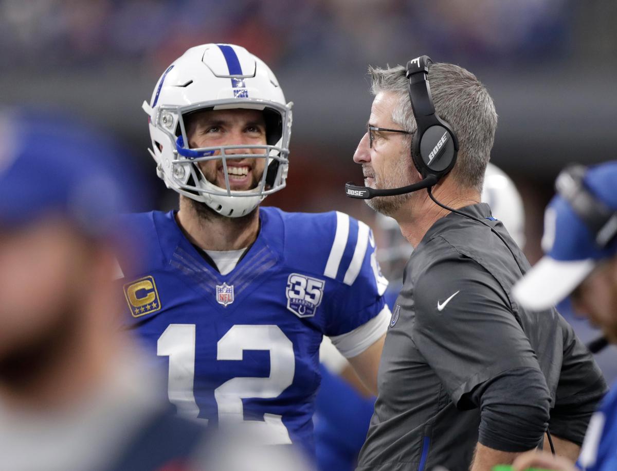 Indianapolis Colts quarterback Andrew Luck (12) talks with coach Frank Reich during the first half of a 38-10 victory over the Tennessee Titans, Sunday, Nov. 18, 2018, in Indianapolis.
