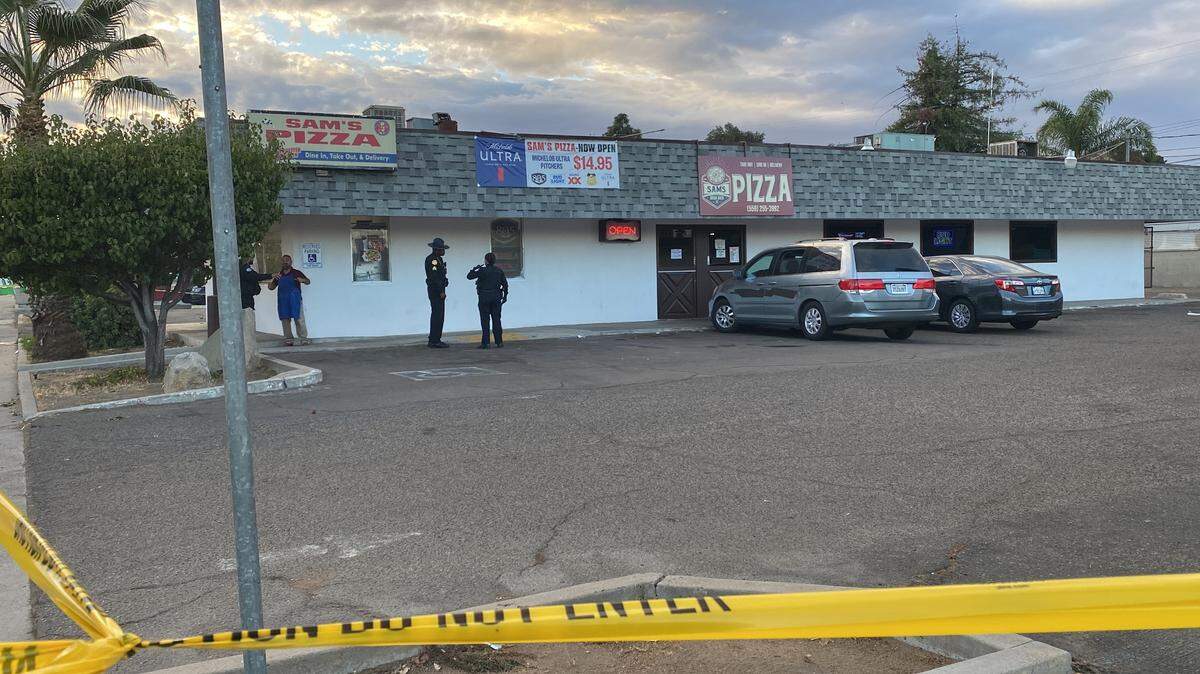 A car-to-car shooting took place in the parking lot at Sam’s Pizza, located at Olive and Chestnut avenues in Fresno, California on Sunday, Oct. 22, 2023.