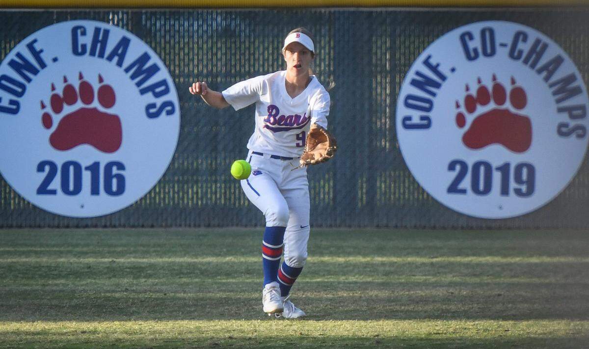 Buchanan outfielder Mia Dal Bon chases down a ball that dropped in for a hit during their game against Clovis East at Buchanan on Friday, April 29, 2022.