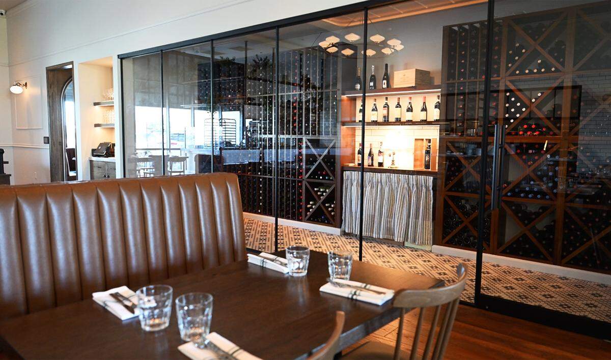 The wine cellar featuring a mix of California and Italian wines is in easy view of the main dining room at Jimmy Pardini's new Italian restaurant Willow Osteria. Photographed Friday, Nov. 7, 2025 in Clovis.