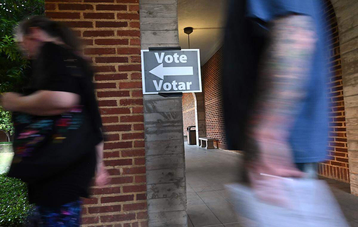 Voters walk towards the voting center at Fresno City College’s Old Administration Building on Tuesday, June 7, 2022 in Fresno.