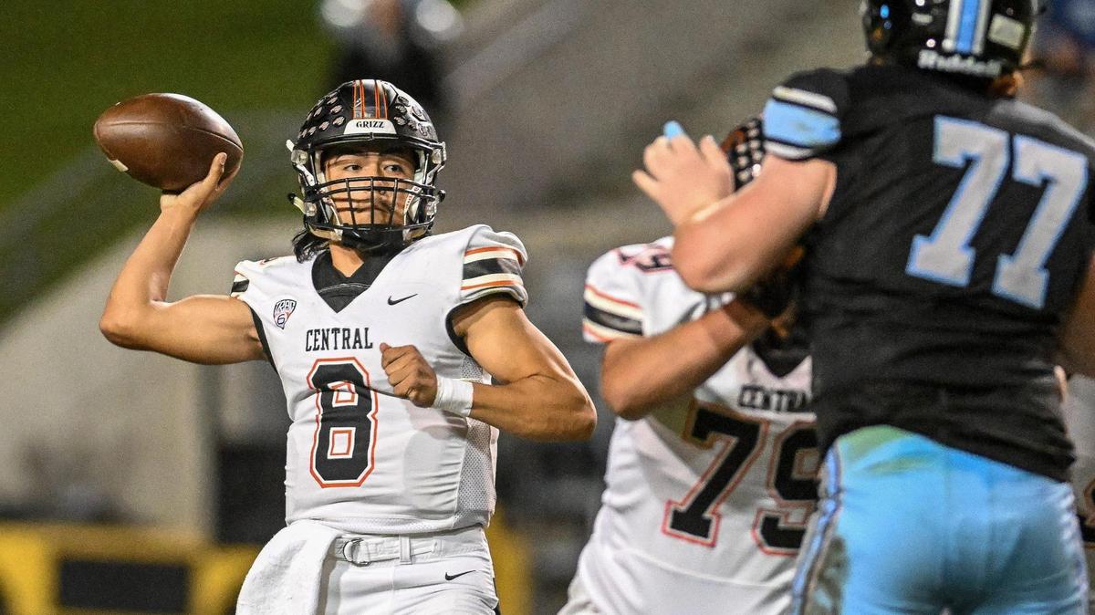 File photo of Central quarterback David Marquez throwing against the Clovis North defense during their their Tri-River Athletic Conference football final at Veterans Memorial Stadium on Thursday, Oct. 26, 2023.