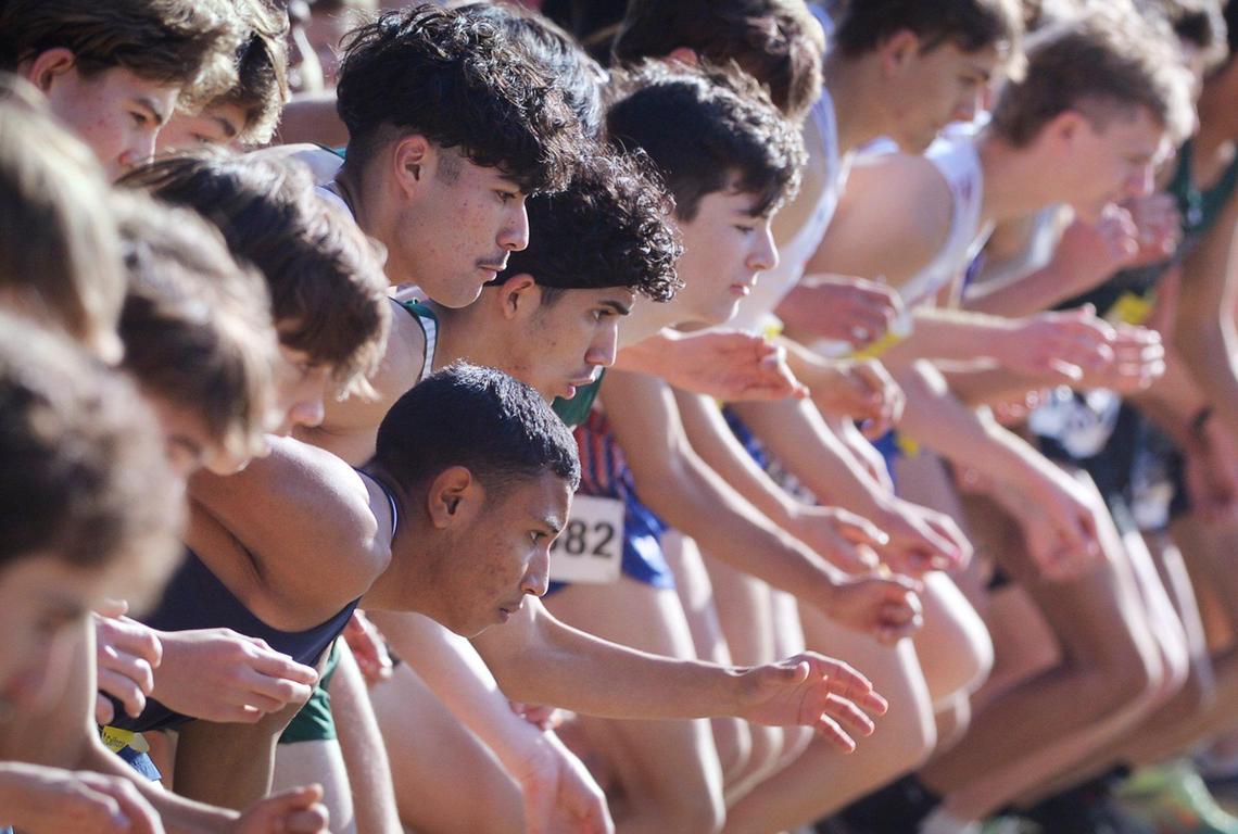 The boys Division V race begins at the CIF state cross country championships held at Woodward Park Saturday, Nov. 27, 2021 in Fresno.