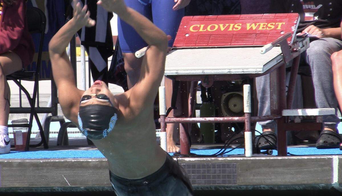 Nicola Saito starts off for Clovis North in the 200 medley relay in the Central Section Division I championships at the Clovis West Aquatics Center on Saturday, May 6, 2023.
