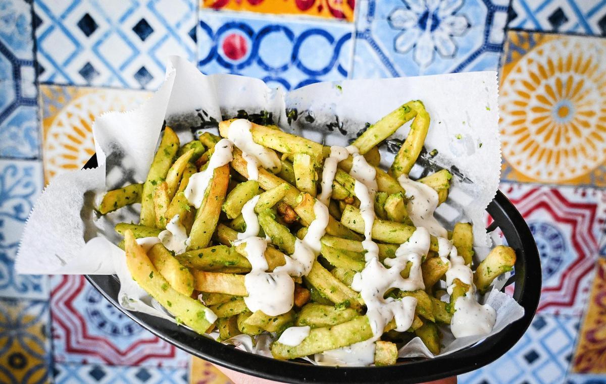 Habanero pesto fries are one of the new menu highlights at CDT Cocina, which is open in Fresno’s Tower District. Photographed on Thursday, May 19, 2022.