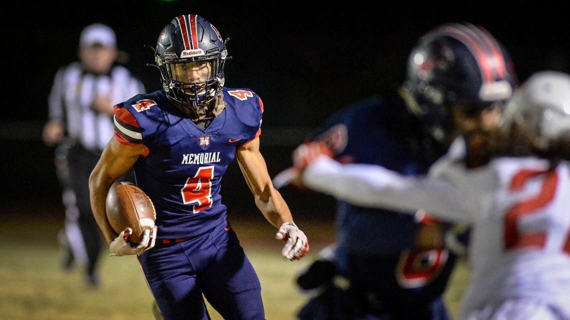 San Joaquin Memorial’s Jalen McMillan looks for blockers while taking the ball down field against Tulare Western during their Division II Central Section championship football game at San Joaquin Memorial on Friday, Nov. 29, 2019.
