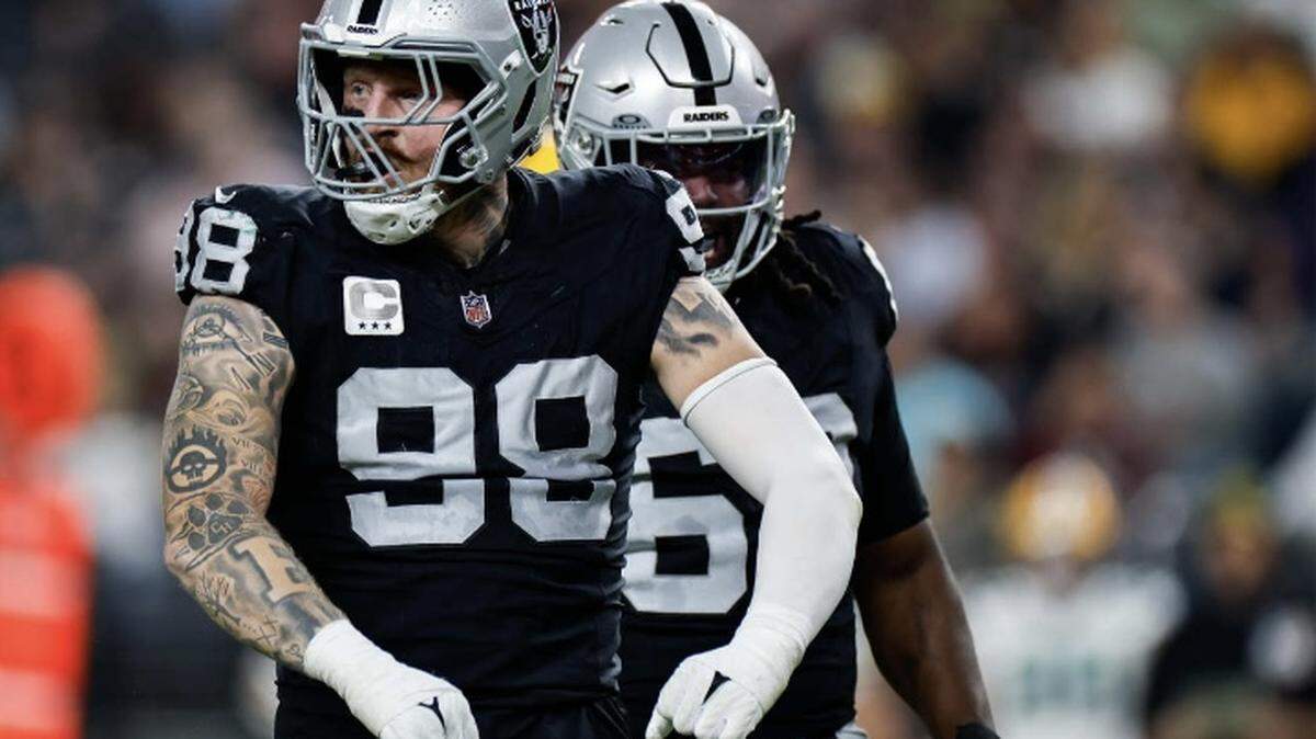 Las Vegas Raiders star pass rusher Maxx Crosby flexes during an NFL game against the Green Bay Packers on Monday, Oct. 9, 2023.
