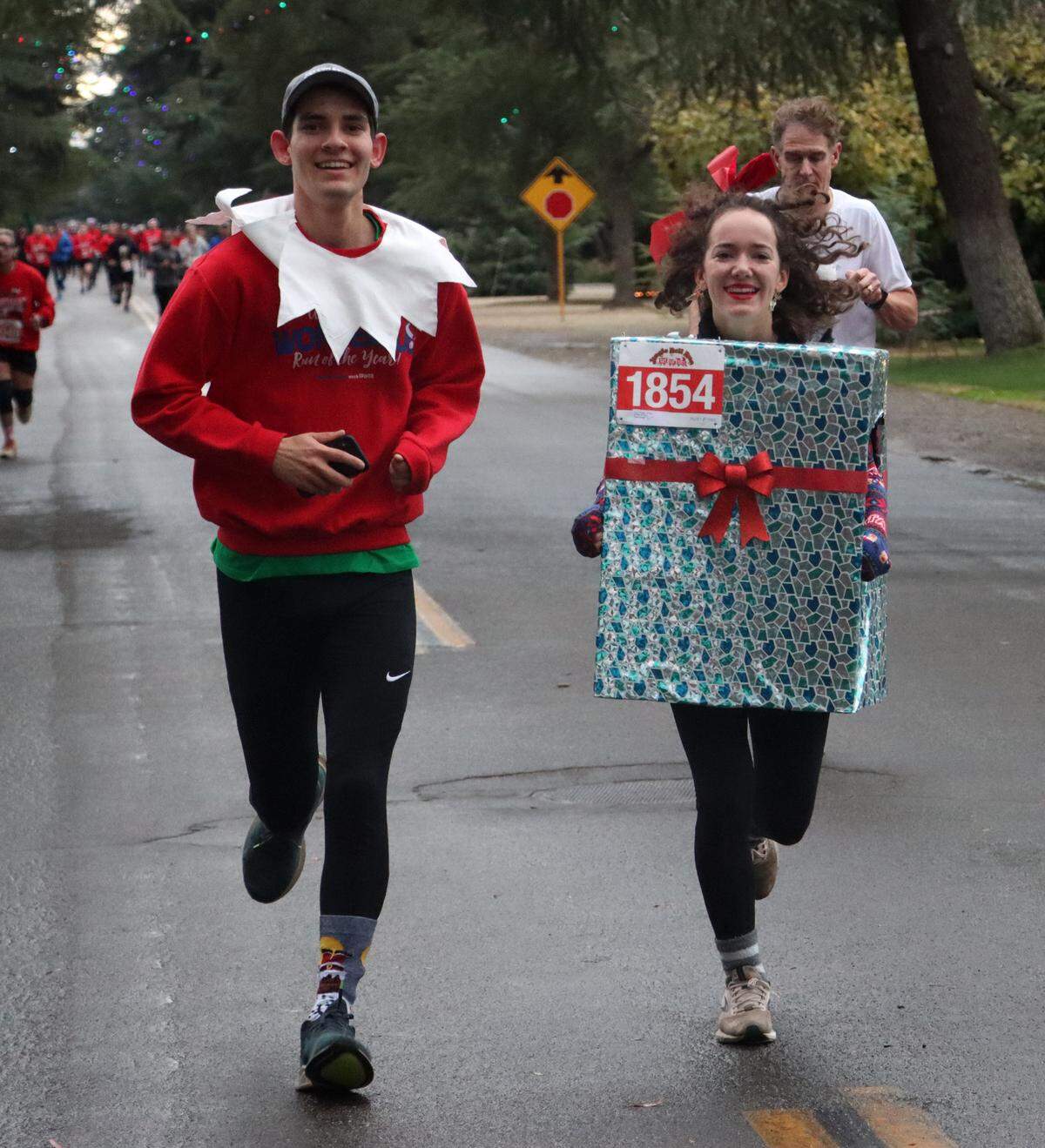 More than 1,500 people participated in the Dec. 10, 2022, Jingle Bell Run for Toys for Tots on Christmas Tree Lane in Fresno.,