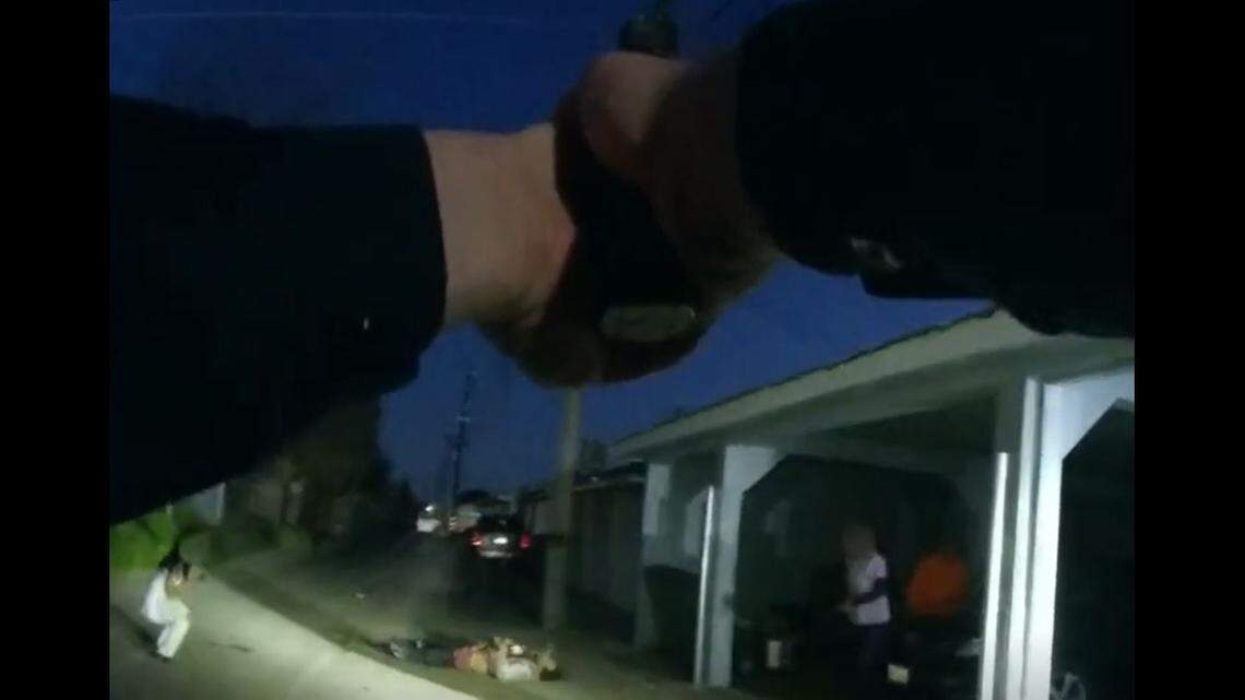 A screengrab from a video released by Fresno police showing an officer shooting a man who they said pointed a gun at officers on April 4, 2023.