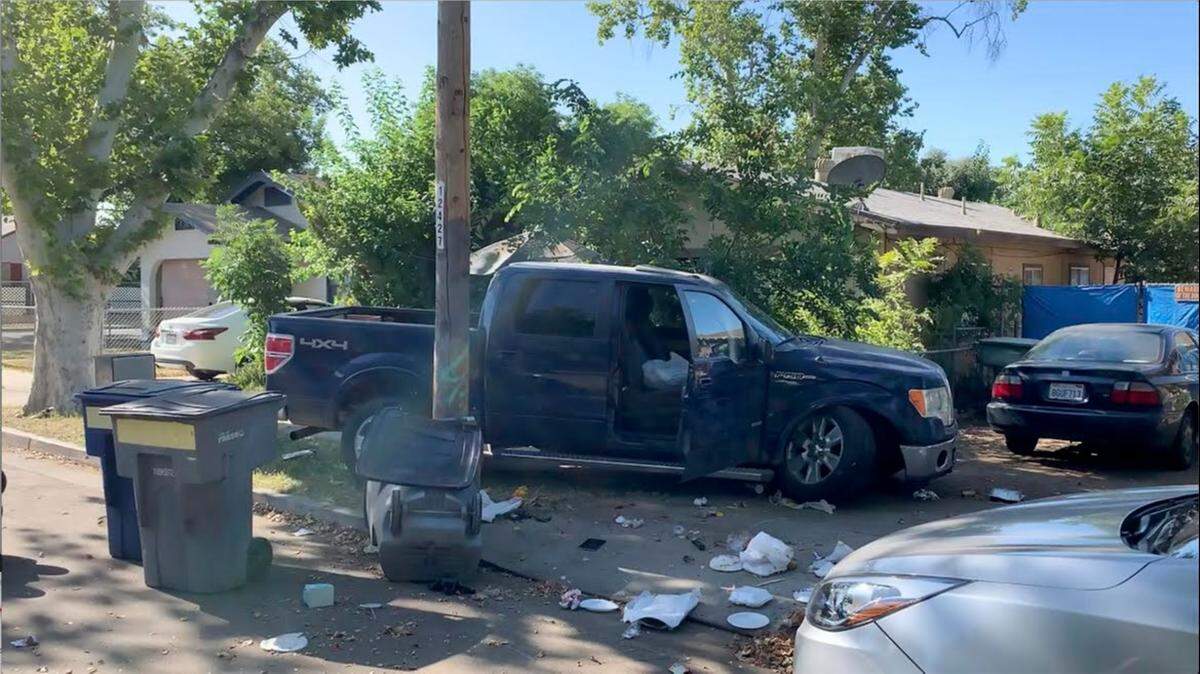 A stolen pickup crashed into a utility pole and trash cans Thursday morning in southeast Fresno.