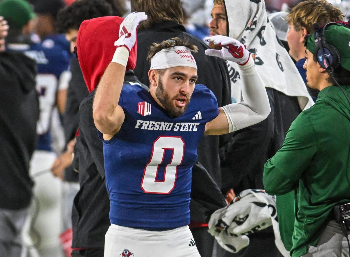 Fresno State’s Mac Delena tries to encourage the fans from the sideline during their game with Hawaii at Valley Children’s Stadium in Fresno on Saturday, Nov. 2, 2024.