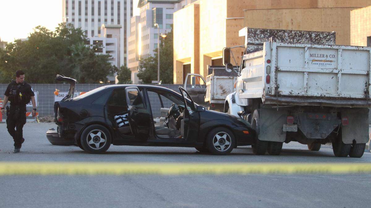 Two juveniles led officers in a car chase in downtown Fresno that ended with the suspects crashing into a truck on Wednesday, Aug. 25, 2018.