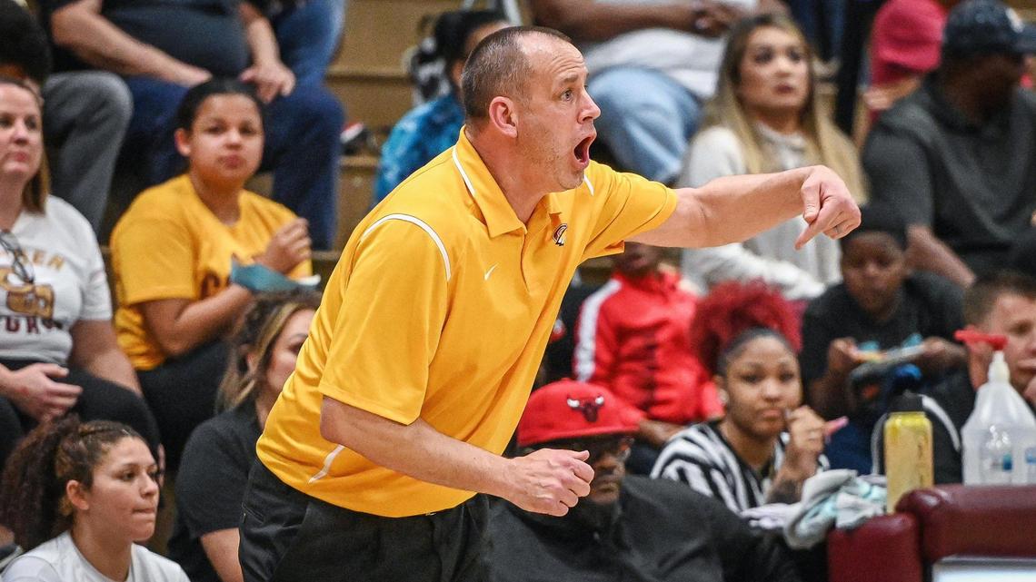 Clovis West head girls basketball coach Craig Campbell yells out plays to the team during their CIF NorCal Open Division state playoff basketball game against Folsom at Clovis West on Wednesday, March 2, 2022.