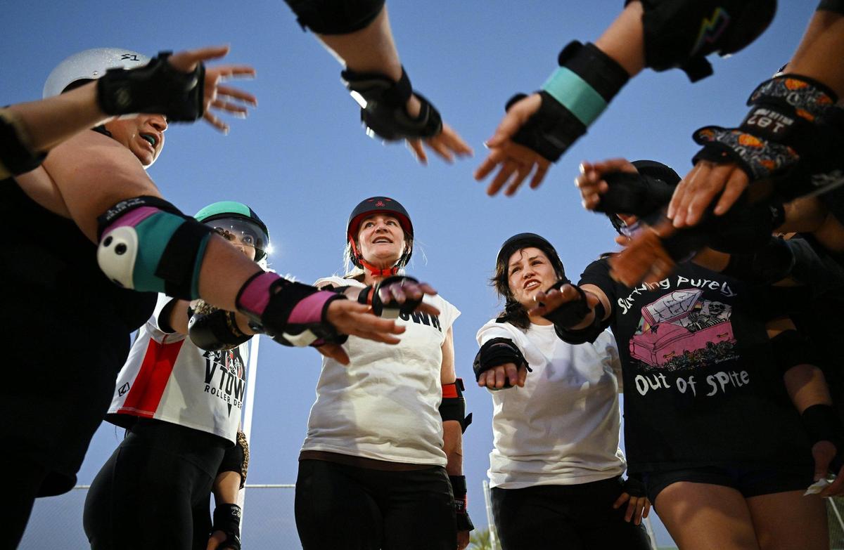 The Ash City Roller Derby team ends practice at Cary Park on Thursday, May 6, 2025, in Fresno, California.