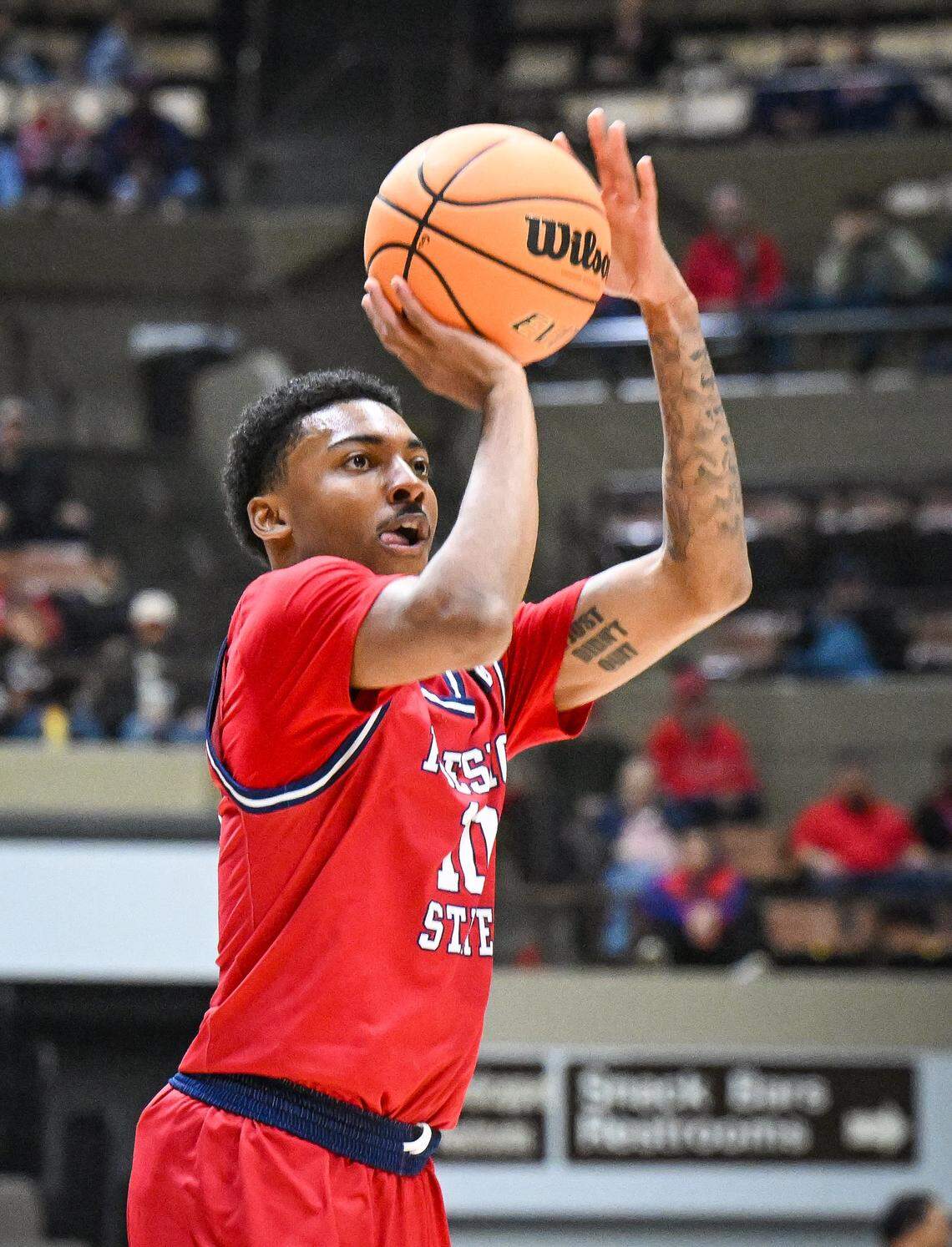 Fresno State's Zaon Collins eyes a jumper against CSU Bakersfield during their non-conference game at Selland Arena in downtown Fresno for the “Return to Selland” game on Sunday, Nov. 30, 2025.