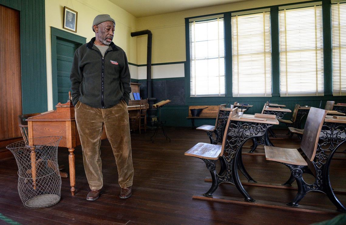Friends of Allensworth docent Emmett Harden in the classroom of the original Allensworth schoolhouse built in 1912 at Colonel Allensworth State Historic Park near Earlimart on Thursday, Feb. 7, 2019.
