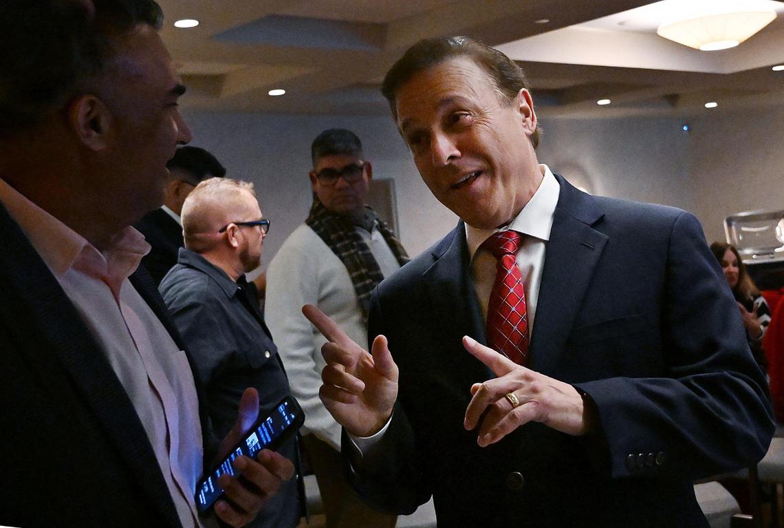 Fresno County Board of Supervisors candidate Garry Bredefeld, right, talks to guests at The Red Room Tuesday, Nov. 5, 2024 in Fresno.