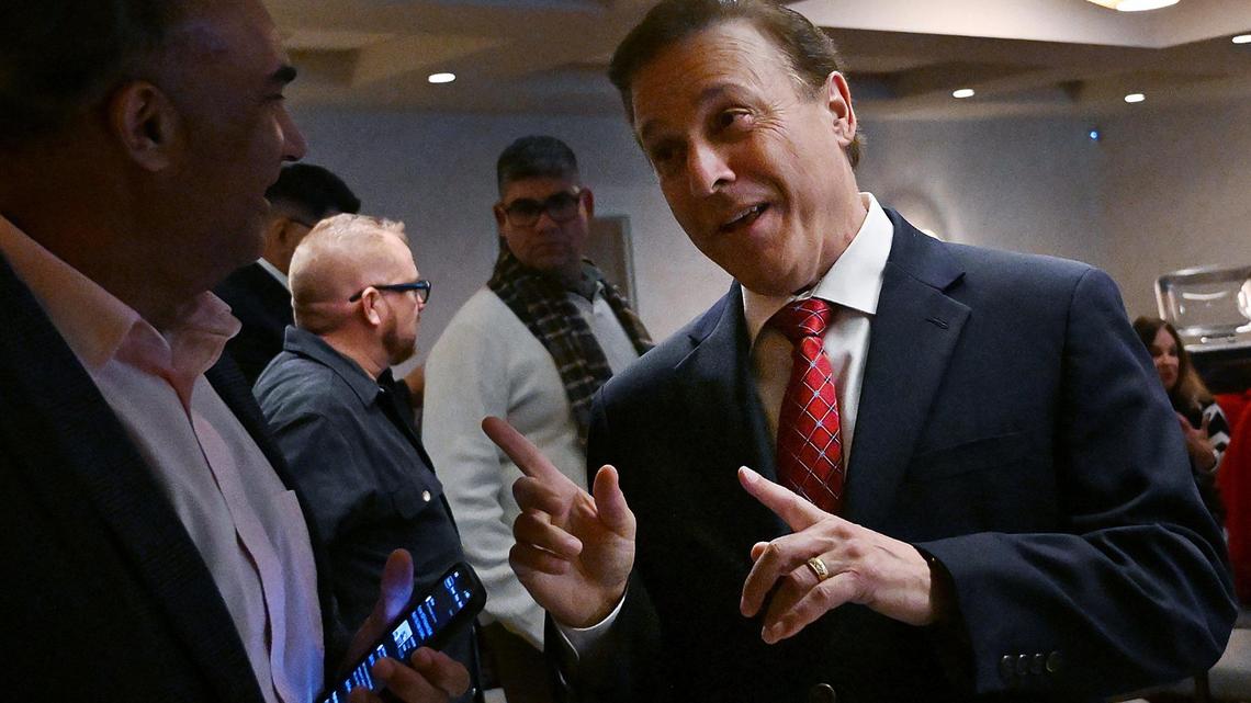 Fresno County Board of Supervisors candidate Garry Bredefeld, right, talks to guests at The Red Room Tuesday, Nov. 5, 2024 in Fresno.