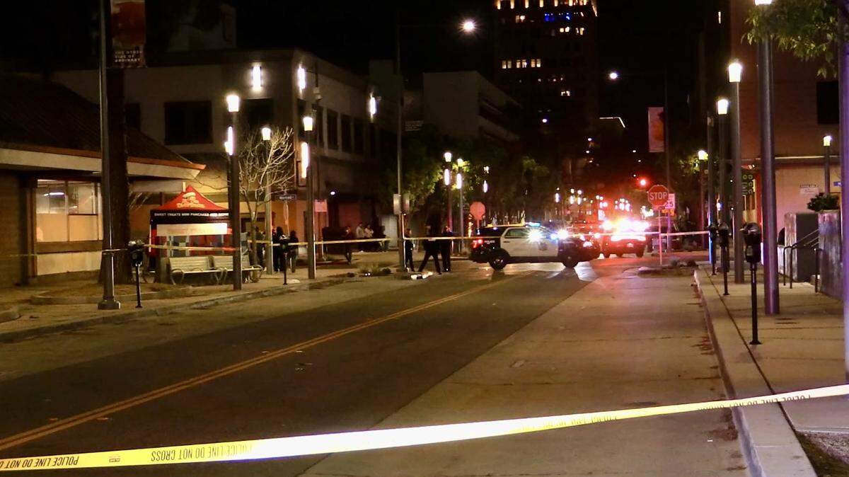 Police blocked off an area in downtown Fresno, California after a shooting that sent a man to the hospital on Sunday, March 31, 2024.