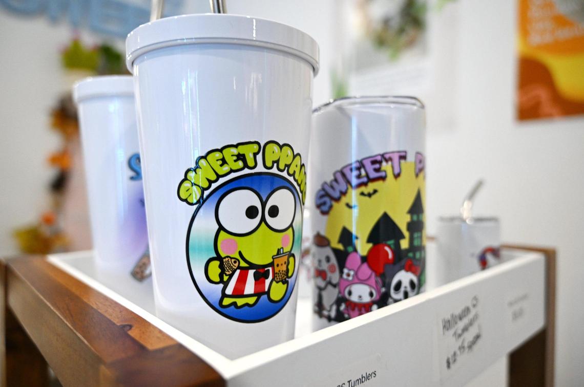 Mugs and more for sale at Sophea and David Thach’s new Sweet Ppang located near First St. and Shields Avenue offering soft serve, ppang, Taiyaki and more. Photographed Tuesday, Nov. 12, 2024 in Fresno.