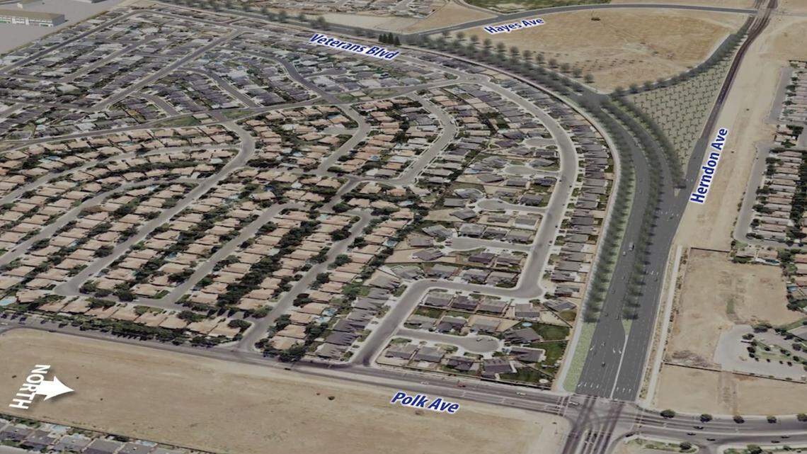 A screenshot of a city of Fresno video about the Veterans Boulevard Corridor Project shows where Veterans Boulevard merges into Herndon Avenue near Polk Avenue. The new road pattern makes eastbound Herndon drivers turn left onto Veterans before continuing to the old Herndon alignment. The design also leaves a landlocked 2.6-acre triangle covered in trees in this depiction.