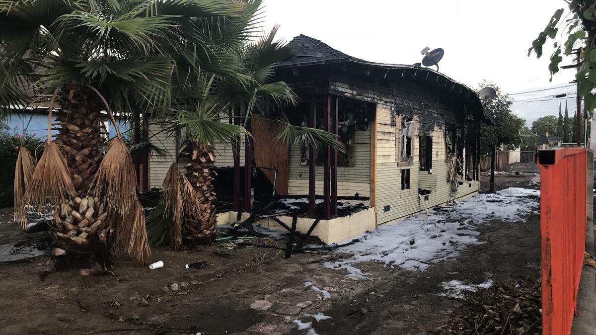 An overnight fire near Howard and Grant avenues in central Fresno destroyed a home on Thursday, Oct. 4, 2018.