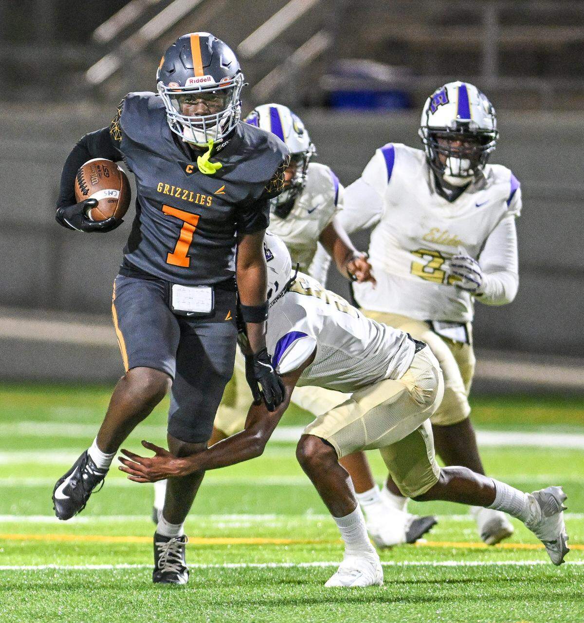 Central West’s Quincey Moore slips by the Elite-Vallejo defense on a run during their game at Koligian Stadium on Thursday, Aug. 21, 2025.