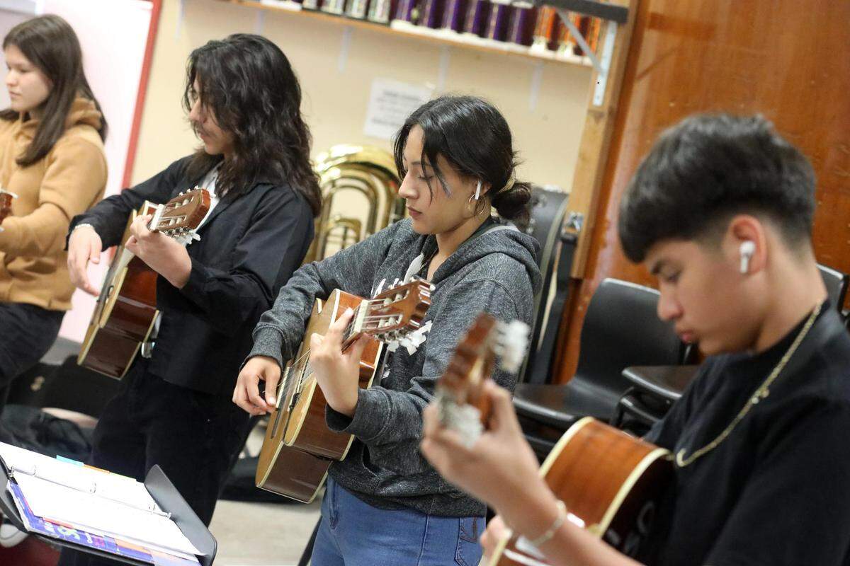 Orosi High School Mariachi Cardenal members during their mariachi class on Wednesday, March 15, 2023.