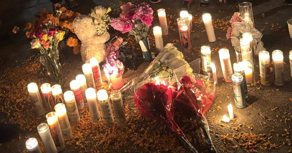 The community held a vigil for Samantha and Elena Kellogg near the intersection of Jefferson and Walnut avenues on Thursday evening after the mother and daughter were killed there in a car crash the day before.