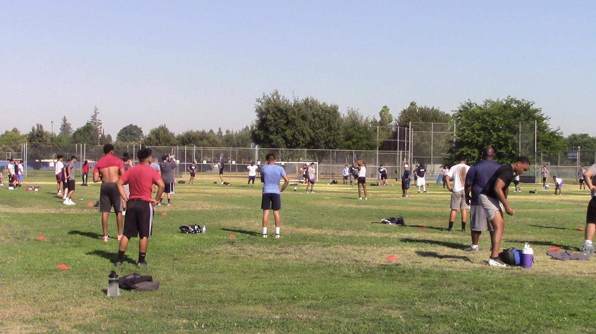 Bullard High conducts football conditioning workouts under guidance from the Fresno County Health Department.