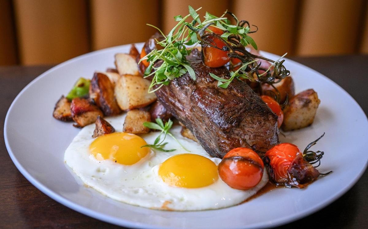 The steak and eggs at Branch Breakfast Co. features Brandt Beef top sirloin, confit tomatoes, eggs and hash browns or country potatoes.