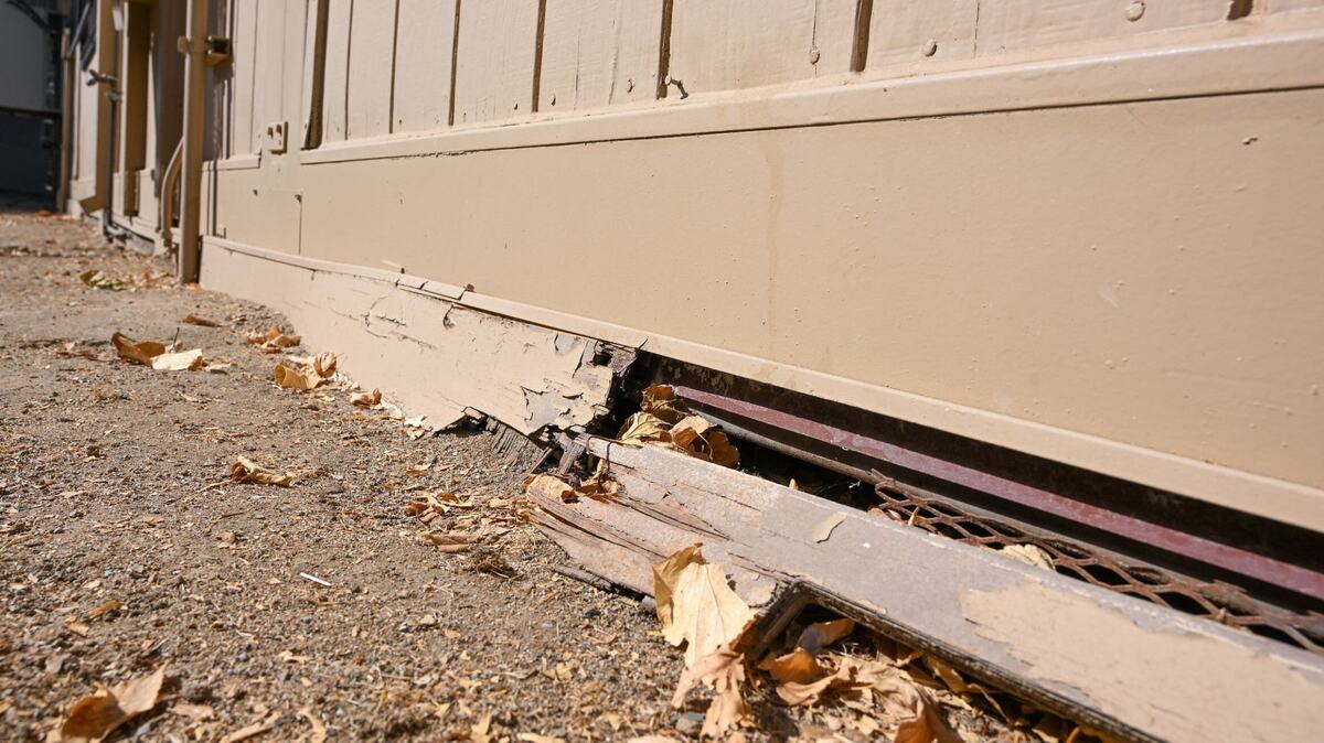 Rotting wood shows where water pools up and causes damage during rainy weather among the portable classrooms at Addams Elementary School in the Fresno Unified School District. Aging portables are among the needs at the school and the district is pushing for the passage of Measure H to meet those needs.