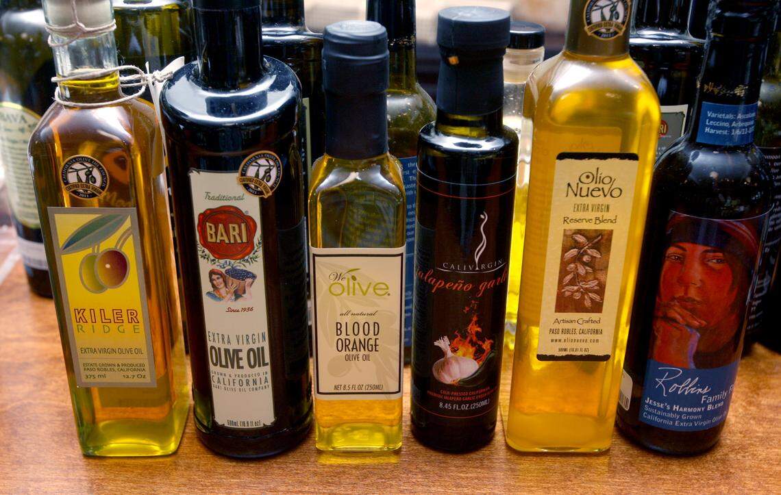 MARK CROSSE/THE FRESNO BEE We Olive is a store specializing in California olive oil and olive oil related items. These are just a few of the bottles of California olive oil.