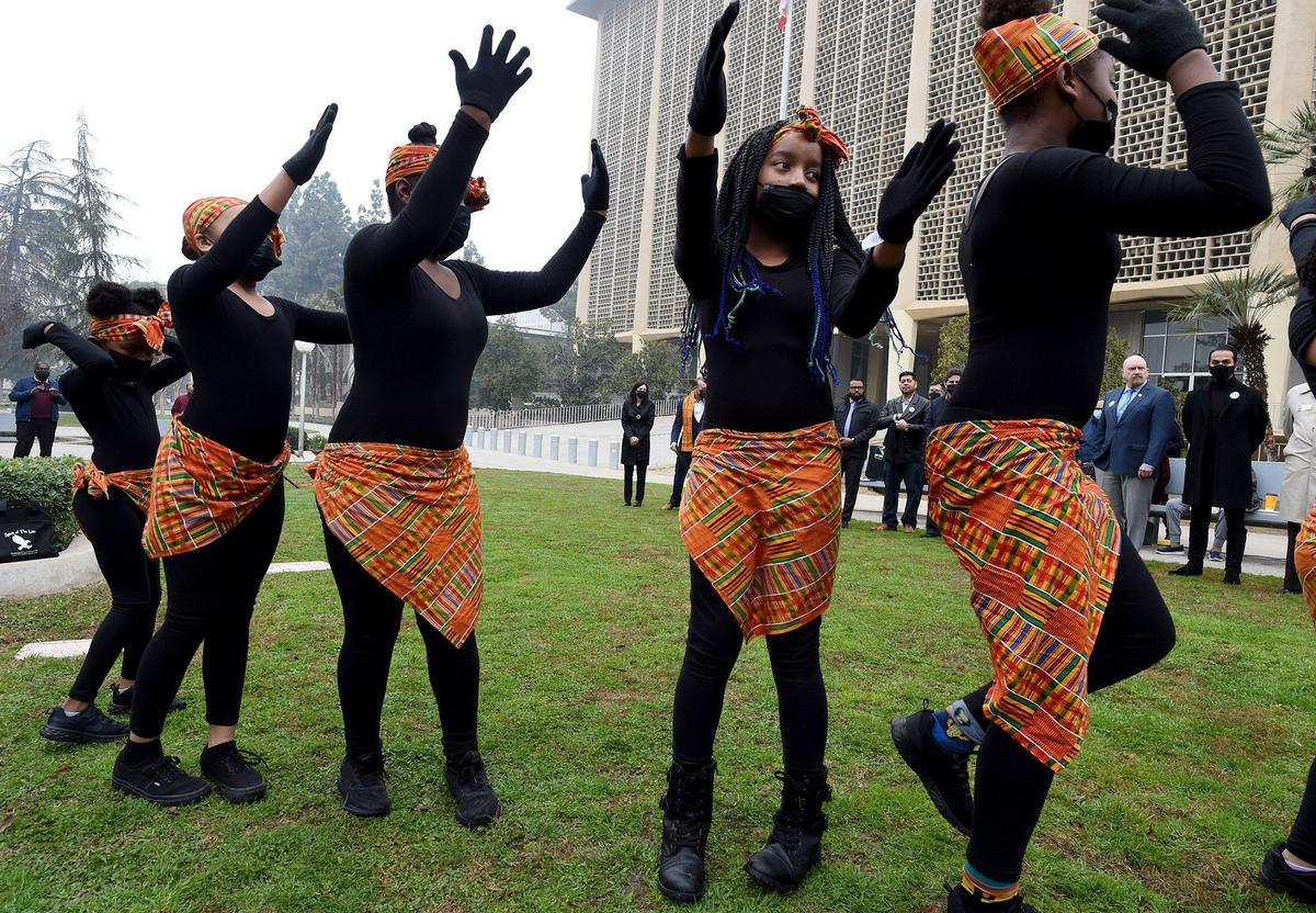 Youngsters from the King African-American Dance Troupe perform during ceremonies to the kick off the 38th annual events to remember and honor the slain civil rights leader Rev. Dr. Martin Luther King, Jr., at Courthouse Park, Friday Jan. 14, 2022.