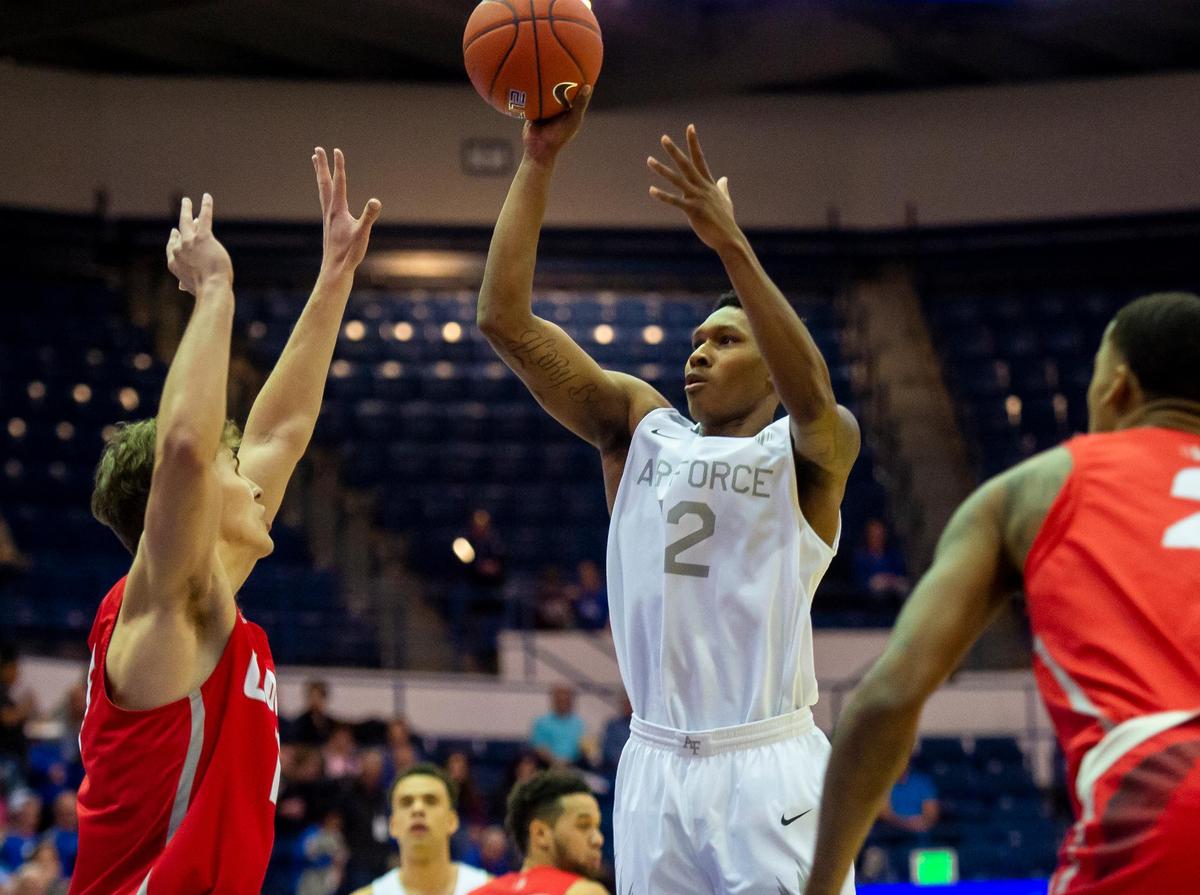 Air Force forward Lavelle Scottie fires away during the Falcons 65-58 loss to the New Mexico Lobos on Wednesday, Jan. 2, 2019, at Air Force Academy, Colo. Scottie took 20 shots in the first half, finishing 10 of 27 in scoring 20 points.